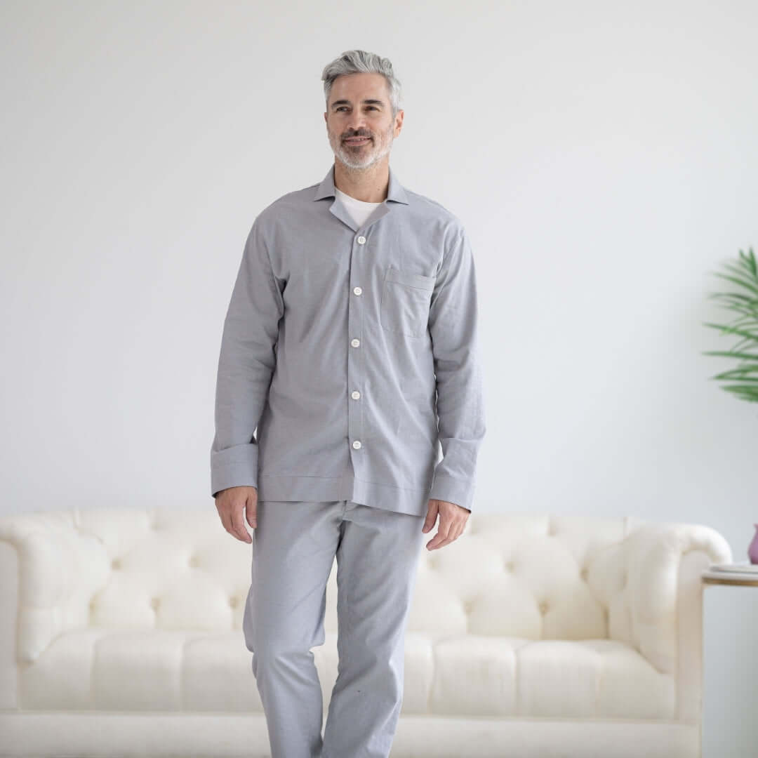 Long Sleeve Grey Pajama Top with Magnetic Closures worn by a man, promoting comfort and ease for nighttime dressing.