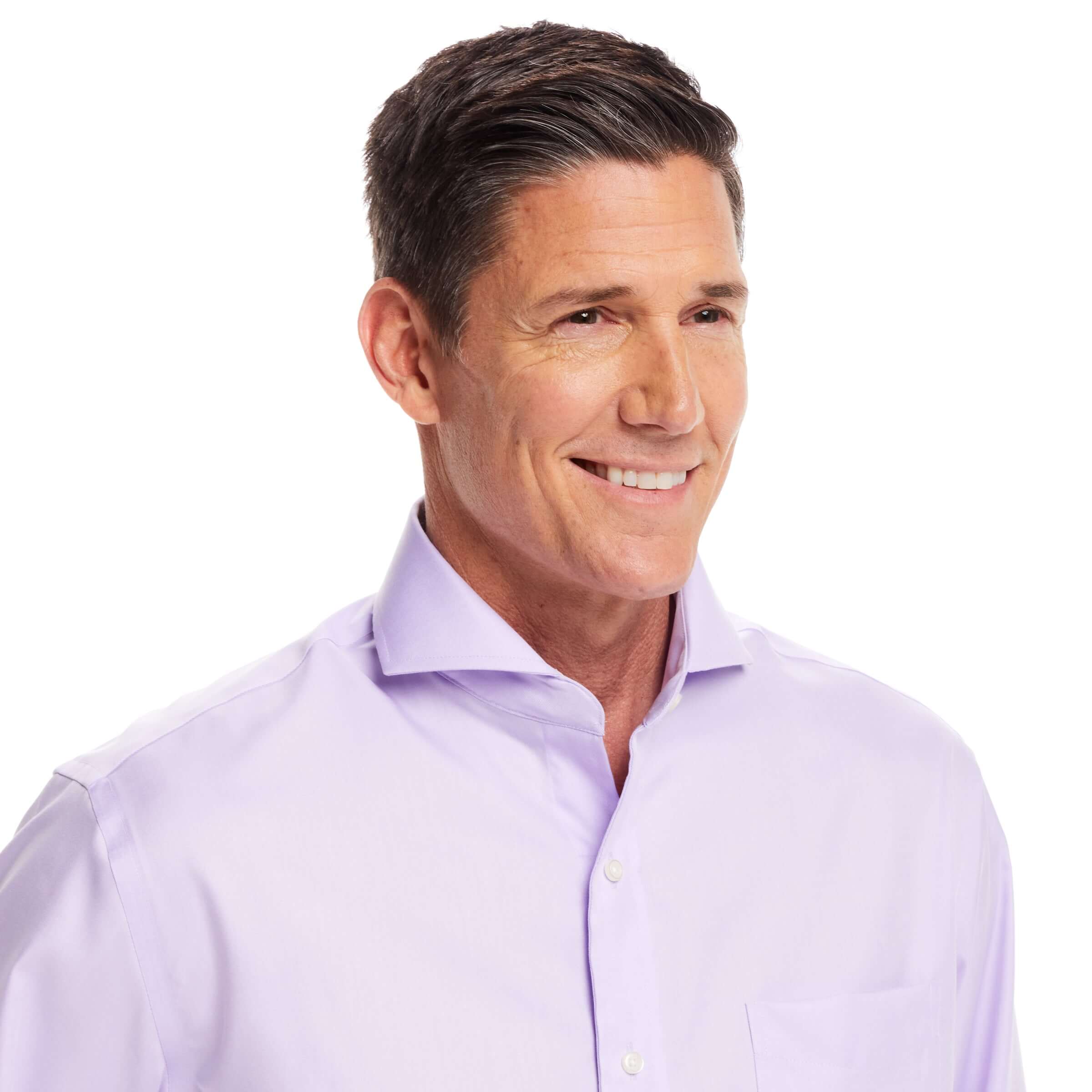 Model wearing a long sleeve lavender 'Bryant' shirt with magnetic closures, showcasing stylish comfort and innovation.