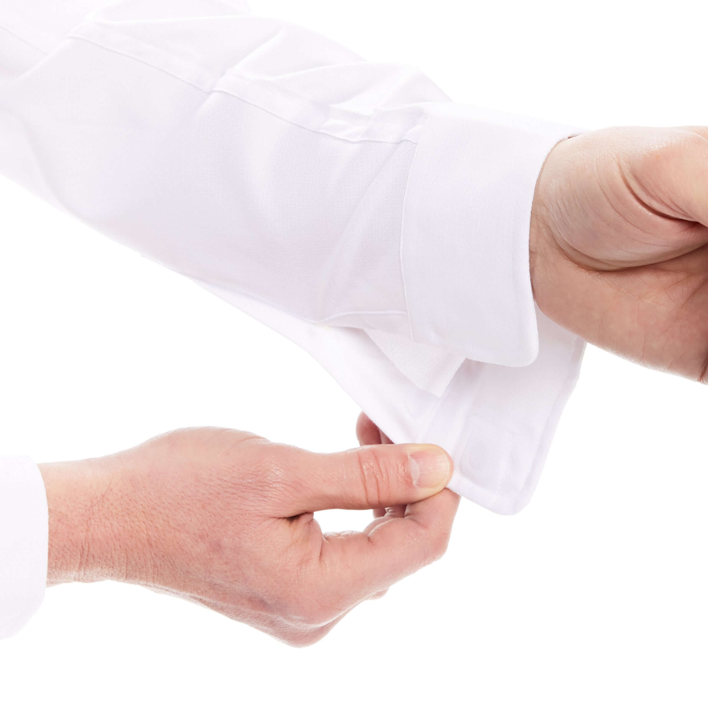 Close-up of a person adjusting the cuff of a Long Sleeve White 'Ryan' Dress Shirt with Magnetic Closures.