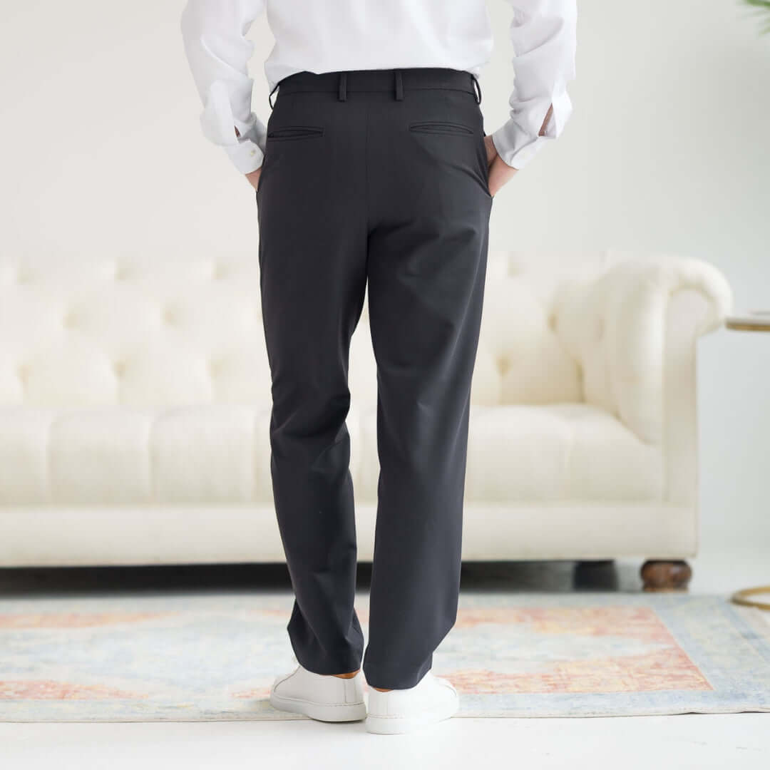 Back view of Nautica® x MagnaReady® Adaptive Fly Stretch Dress Pant in Black, featuring a modern fit and sleek design.