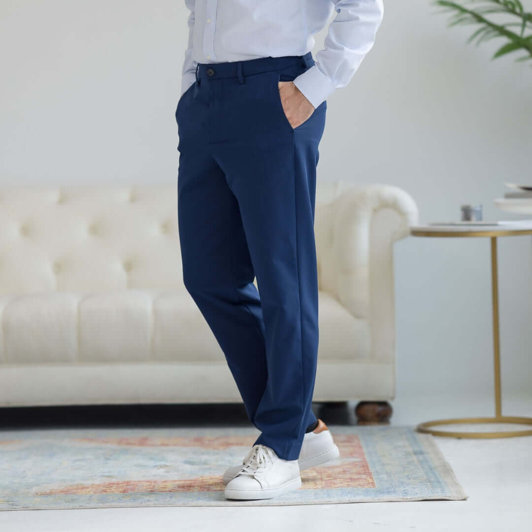 Nautica x MagnaReady adaptive fly stretch dress pant in navy, styled with a white shirt and casual shoes.