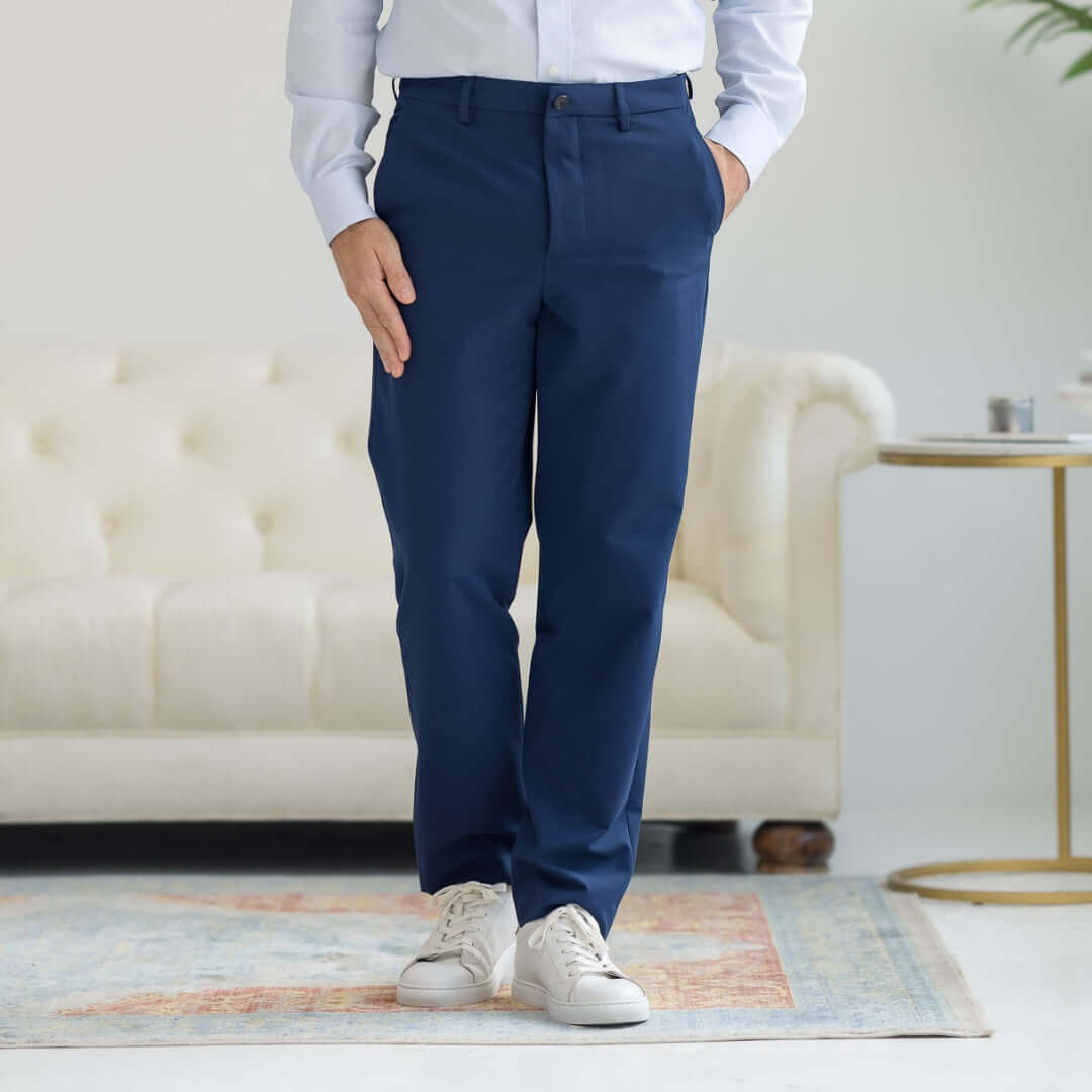Men's navy dress pants from Nautica® x MagnaReady®, featuring a modern adaptive stretch fit.