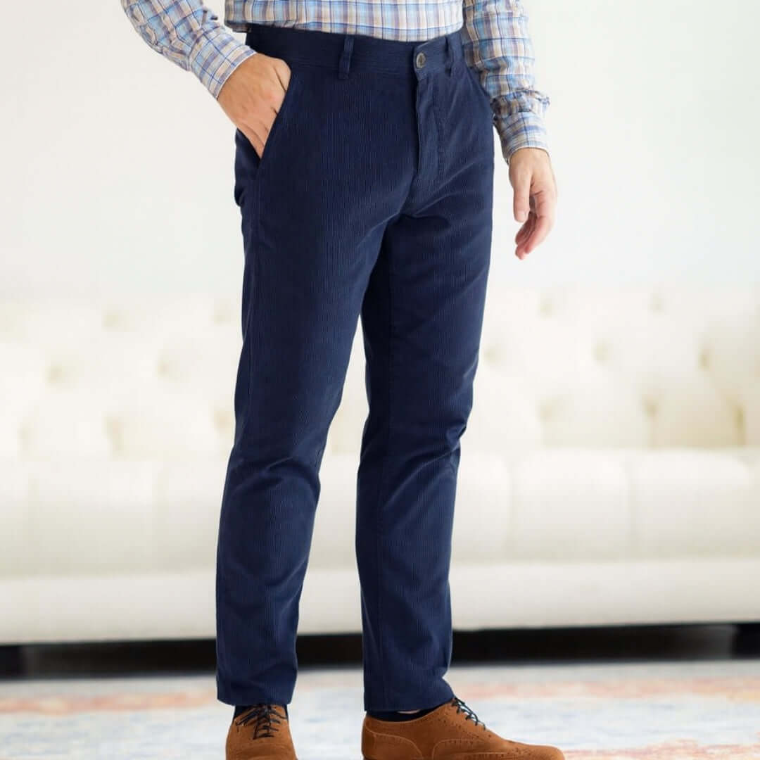 Model wearing Navy Fine Wale Adaptive Corduroy Magnetic Fly Front Pant, showcasing adaptive design for comfort and style.