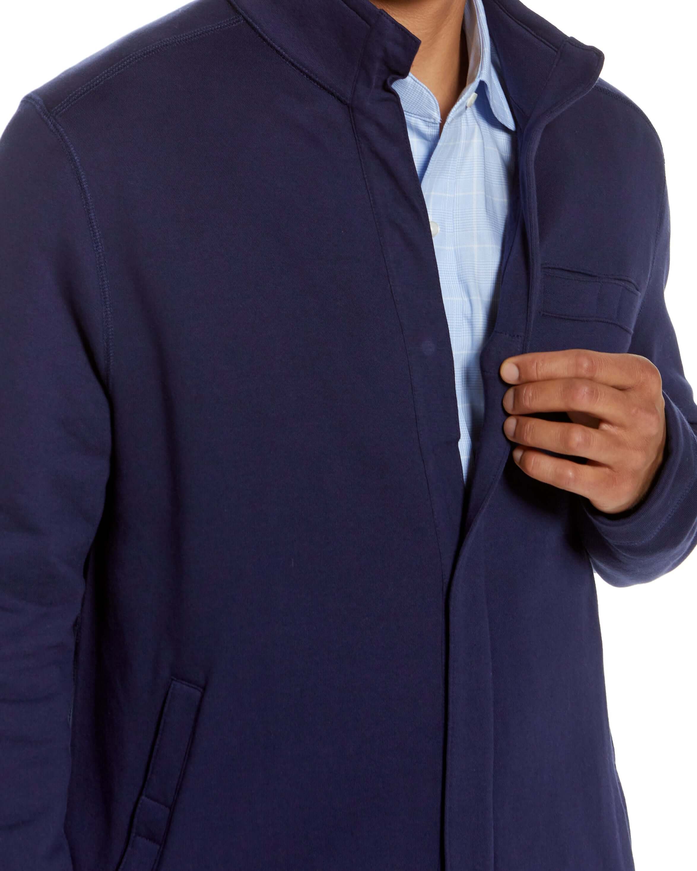 Navy knit fleece long sleeve Dillon jacket showcasing magnetic closures for easy wear and comfort.