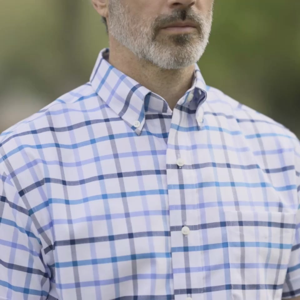 Blue and White Tattersall Short Sleeve Shirt with Magnetic Closures worn by a man, featuring button-down collar.