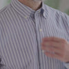 Close-up view of a grey stripe long sleeve button-down collar shirt with magnetic closures, suitable for adaptive clothing.