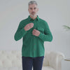Model wearing a green waffle weave casual shirt with oversized pockets, designed for comfort and accessibility.