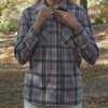 Women's adaptive flannel shirt in pink, navy and gray, featuring a front curved hem and stylish plaid design.
