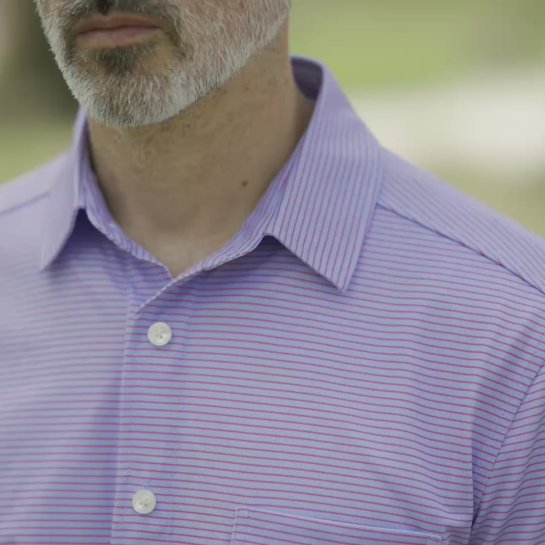 Adaptive Cooling Magnetic Front Short Sleeve Shirt in Pink and Blue Stripe worn by a model outdoors.