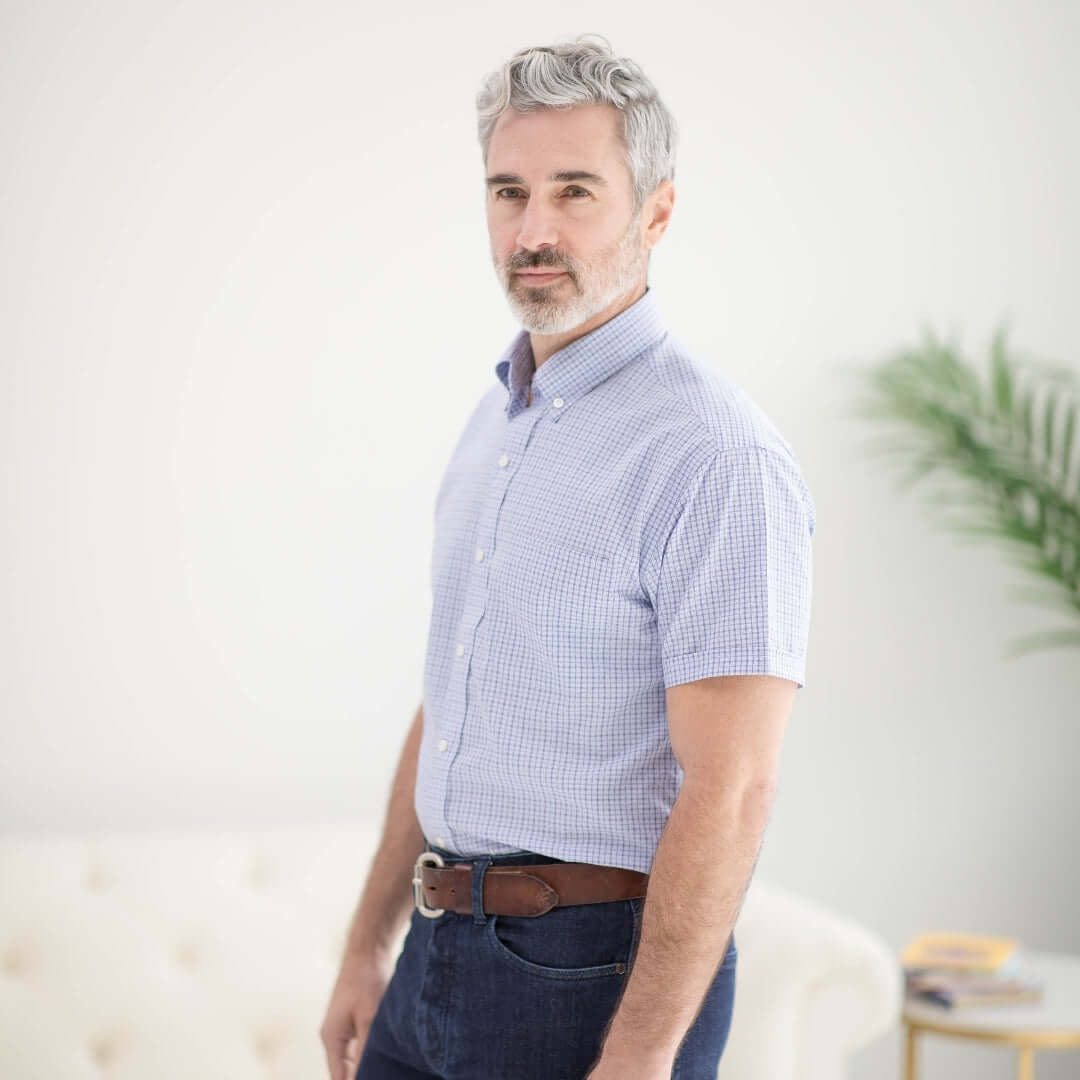 Heights short sleeve blue and red check cotton shirt with pocket on a model, showcasing classic style and comfort.