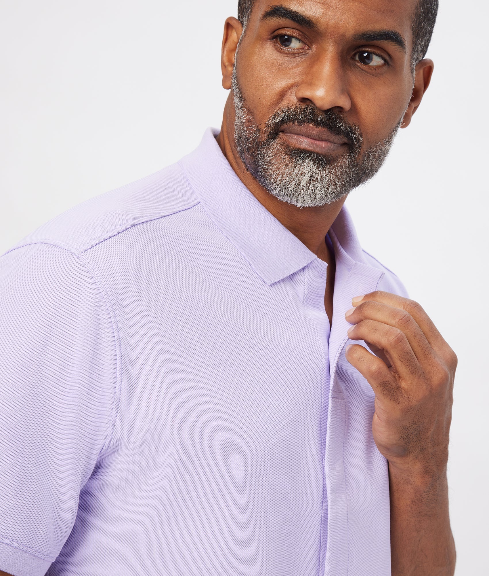 Solid Pique Knit Short Sleeve Polo with Magnetic Closures in Lavender